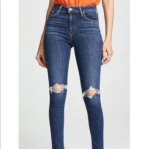 Levi’s 721 high rise skinny distressed jeans
